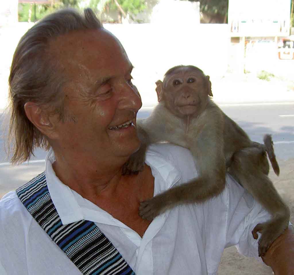 Artistic photo of Wiesław Sadurski with a companion monkey, symbolizing life's shared journey.