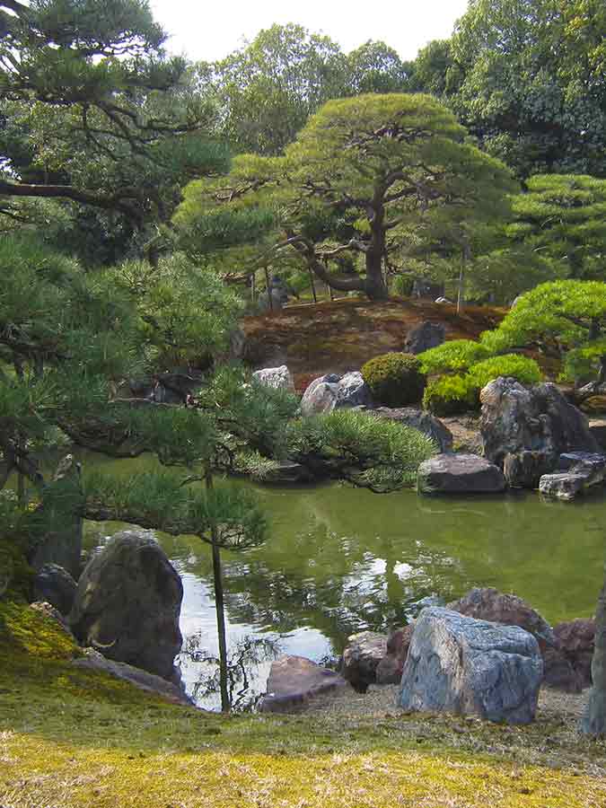 Pond rocks trees Nijo-jo Garden Kyoto, photo by Wiesław Sadurski